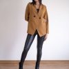 Klelia Jacket in solid fabric regular line with crossed buttons.