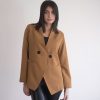 Klelia Jacket in solid fabric regular line with crossed buttons.