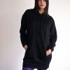 Sofi sport dress with hood made of elastic fabric with long sleeves.